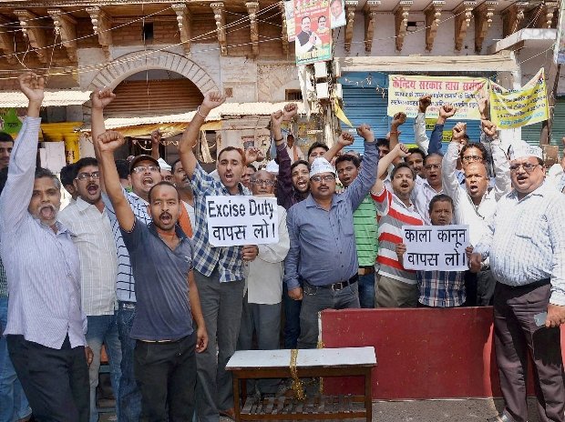 Jewellers block the road during a protest against hike in excise duty on gold